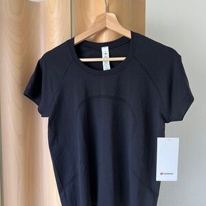 NWT lululemon athletica Swiftly Short sleeve race length Black Women's Top